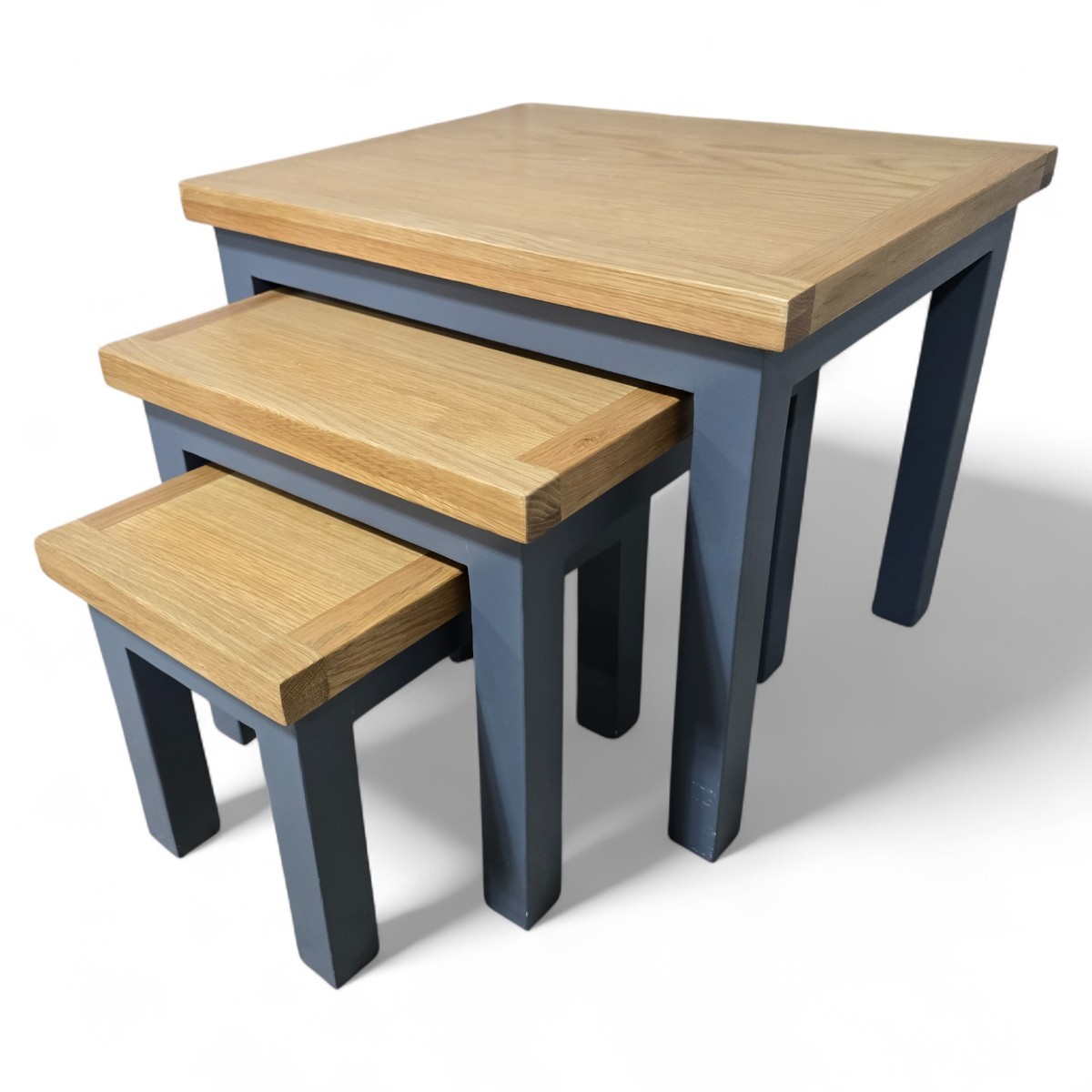 Pre-owned Next nest of tables in solid wood with soft bluey-grey frames and natural oak tops for timeless appeal