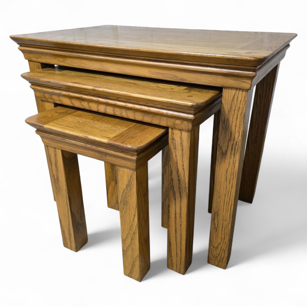 PreLoved Barker and Stonehouse oak nest of tables in medium oak finish with natural wood grain detail and clean profiles.