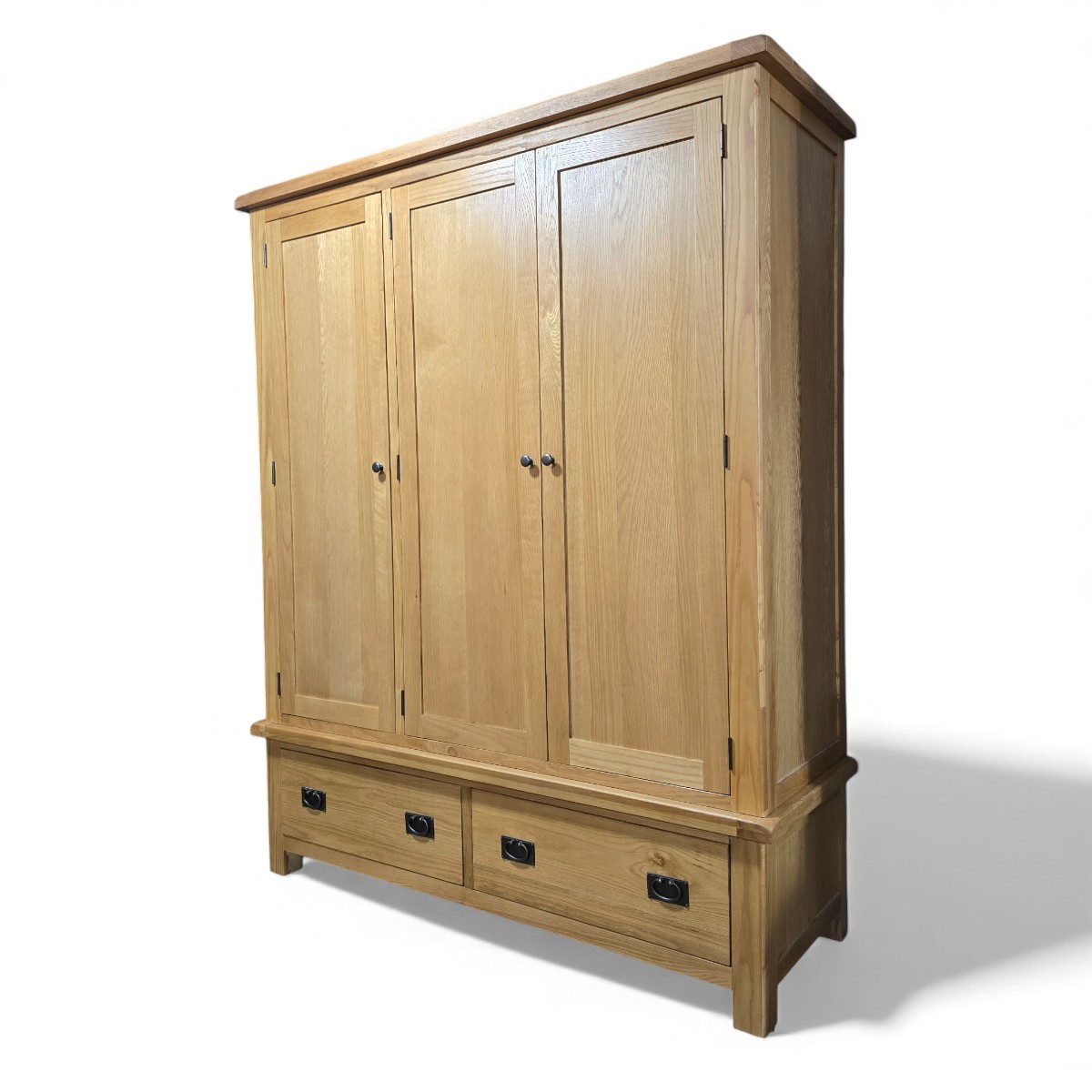 PreLoved solid oak wardrobe featuring clean lines, warm tones, and a functional three-door design perfect for stylish storage.
