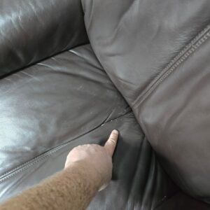 Peek inside its story... then write your own chapter with this second-hand La-Z-boy recliner and footstool set.