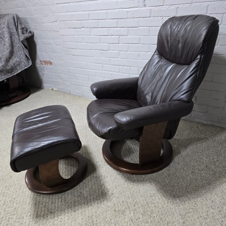 Peek inside its story... then write your own chapter with this second-hand La-Z-boy recliner and footstool set.