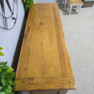 Explore the timeless charm of this pre-loved Barker and Stonehouse Rustic Solid Oak Sideboard.