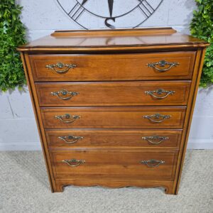Peek inside its story... then write your own chapter with this pre-loved dark oak veneer chest of drawers.