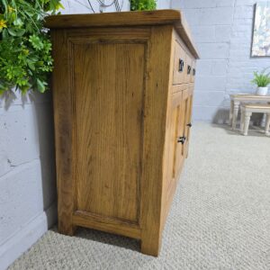 Explore the timeless charm of this pre-loved Barker and Stonehouse Rustic Solid Oak Sideboard.