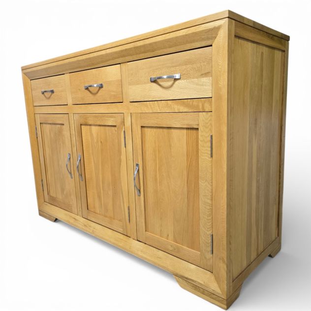 Pre-loved Bevel Natural Solid Oak Large sideboard with clean lines and honeyed finish, offering substantial savings