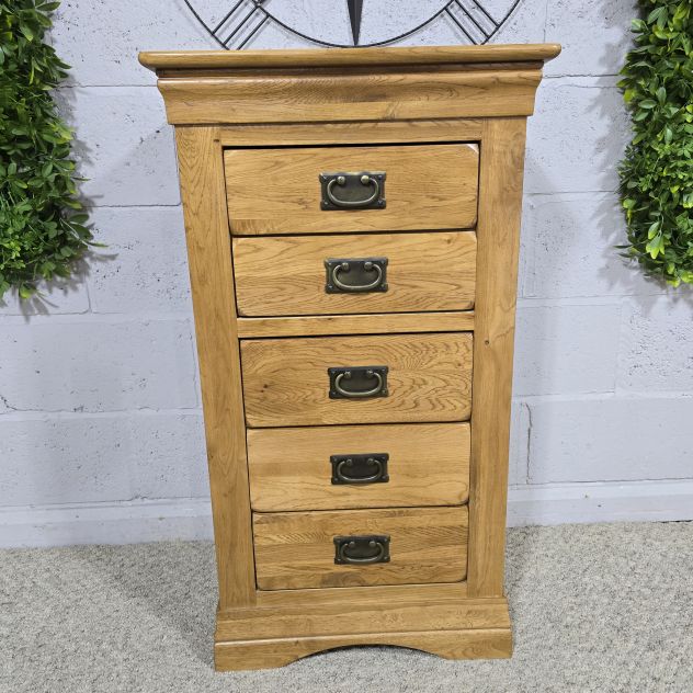 Peek inside its story... then write your own chapter with this pre-owned Oak Furniture Land French Farmhouse tallboy Peek inside its story... then write your own chapter with this pre-owned Oak Furniture Land French Farmhouse tallboy