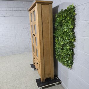 Peek inside its story... then write your own chapter with this pre-loved solid oak display unit. Peek inside its story... then write your own chapter with this pre-loved solid oak display unit.