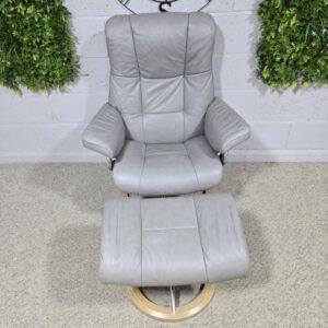 Peek inside its story... then write your own chapter with the Ekornes Stressless Mayfair Recliner & Footstool Peek inside its story... then write your own chapter with the Ekornes Stressless Mayfair Recliner & Footstool