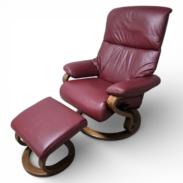Elevate Your Space with the Himolla Zerostress 9046 Recliner and Footstool in Burgundy Leather Elevate Your Space with the Himolla Zerostress 9046 Recliner and Footstool in Burgundy Leather