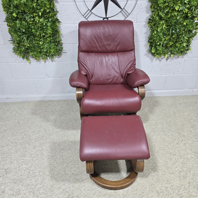 Elevate Your Space with the Himolla Zerostress 9046 Recliner and Footstool in Burgundy Leather Elevate Your Space with the Himolla Zerostress 9046 Recliner and Footstool in Burgundy Leather