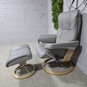 Peek inside its story... then write your own chapter with the Ekornes Stressless Mayfair Recliner & Footstool Peek inside its story... then write your own chapter with the Ekornes Stressless Mayfair Recliner & Footstool