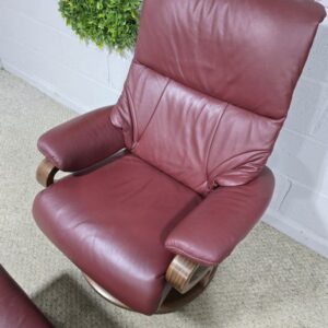 Elevate Your Space with the Himolla Zerostress 9046 Recliner and Footstool in Burgundy Leather Elevate Your Space with the Himolla Zerostress 9046 Recliner and Footstool in Burgundy Leather