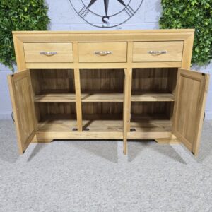 Pre-loved Bevel Natural Solid Oak Large sideboard - Save hundreds on this elegant piece Pre-loved Bevel Natural Solid Oak Large sideboard - Save hundreds on this elegant piece