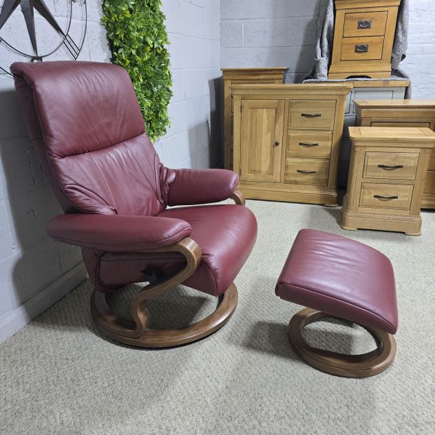Elevate Your Space with the Himolla Zerostress 9046 Recliner and Footstool in Burgundy Leather Elevate Your Space with the Himolla Zerostress 9046 Recliner and Footstool in Burgundy Leather