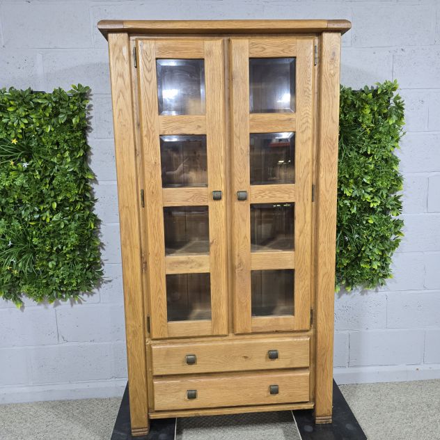 Peek inside its story... then write your own chapter with this pre-loved solid oak display unit. Peek inside its story... then write your own chapter with this pre-loved solid oak display unit.