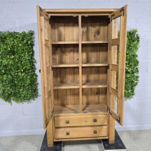 Peek inside its story... then write your own chapter with this pre-loved solid oak display unit. Peek inside its story... then write your own chapter with this pre-loved solid oak display unit.