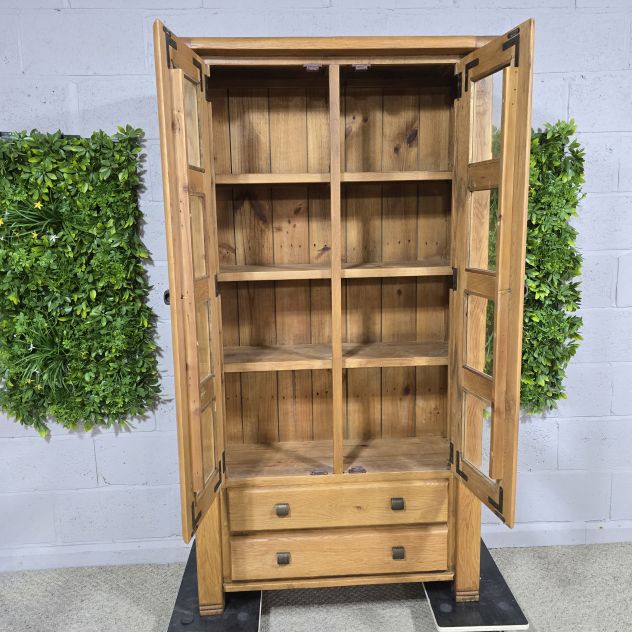 Peek inside its story... then write your own chapter with this pre-loved solid oak display unit. Peek inside its story... then write your own chapter with this pre-loved solid oak display unit.