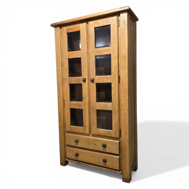 Peek inside its story... then write your own chapter with this pre-loved solid oak display unit. Peek inside its story... then write your own chapter with this pre-loved solid oak display unit.