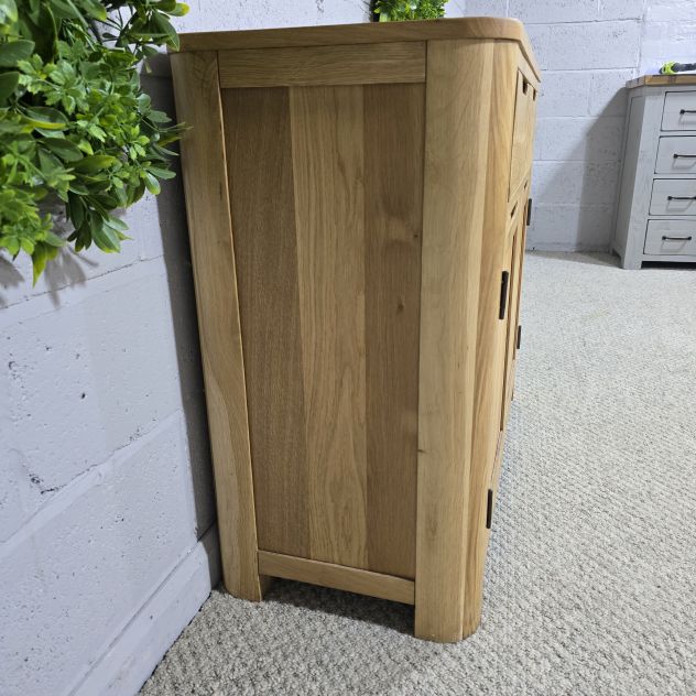 Peek inside its story... then write your own chapter with this pre-loved Oak FurnitureLand Romsey sideboard. Peek inside its story... then write your own chapter with this pre-loved Oak FurnitureLand Romsey sideboard.