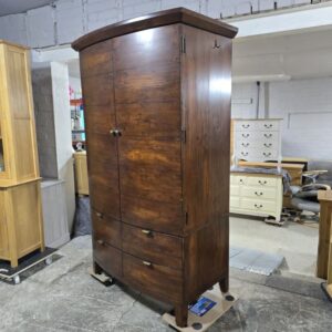 Peek inside its story... then write your own chapter with this pre-owned Barker and Stonehouse Navajos double wardrobe. Peek inside its story... then write your own chapter with this pre-owned Barker and Stonehouse Navajos double wardrobe.