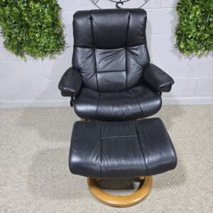 Elegant Ekornes Stressless Mayfair Recliner Armchair and Footstool in Black Leather