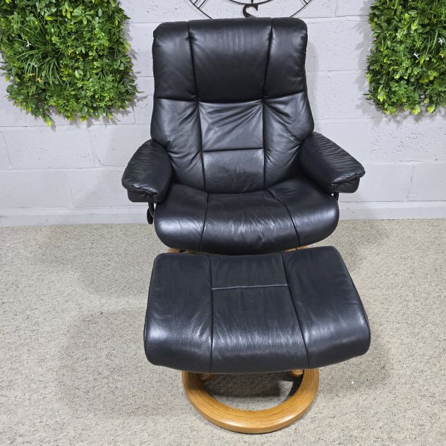 Elegant Ekornes Stressless Mayfair Recliner Armchair and Footstool in Black Leather