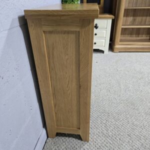 Peek inside its story... then write your own chapter with this PreLoved solid oak wine rack.
