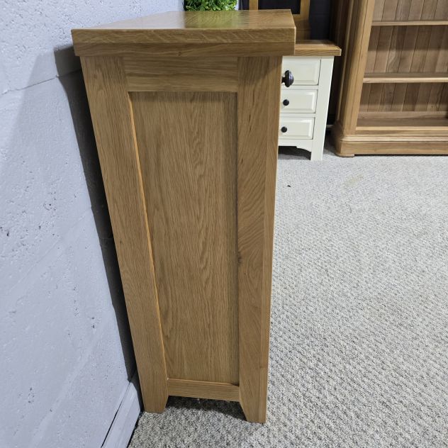 Peek inside its story... then write your own chapter with this PreLoved solid oak wine rack.