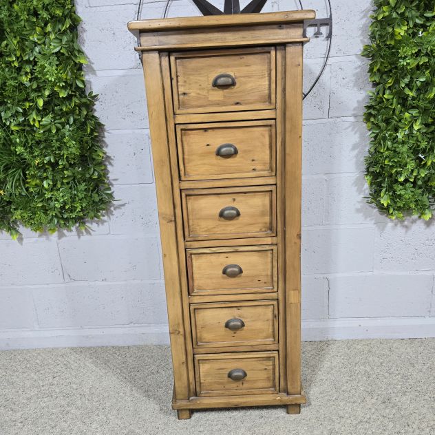 Peek inside its story... then write your own chapter with this Barker and Stonehouse tallboy. Peek inside its story... then write your own chapter with this Barker and Stonehouse tallboy.