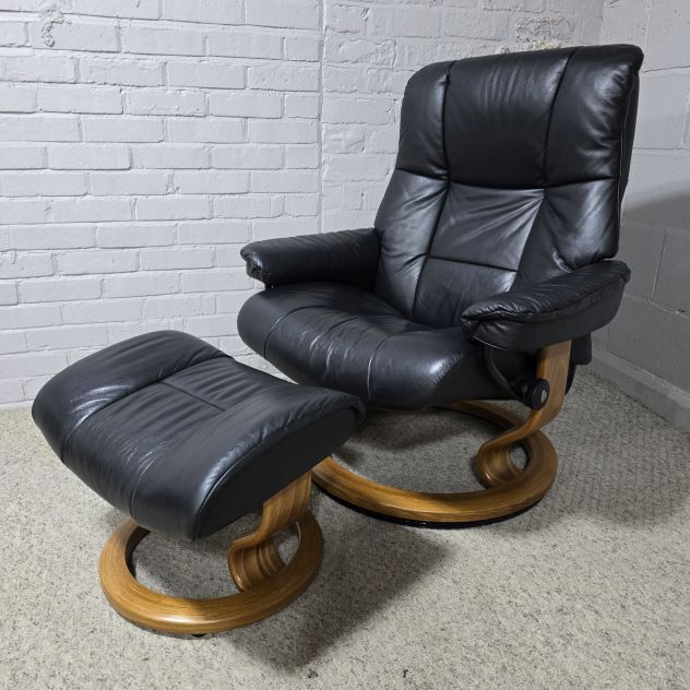 Elegant Ekornes Stressless Mayfair Recliner Armchair and Footstool in Black Leather