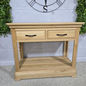 Peek inside its story... then write your own chapter with this PreLoved Oak FurnitureLand Canterbury console table. Peek inside its story... then write your own chapter with this PreLoved Oak FurnitureLand Canterbury console table.
