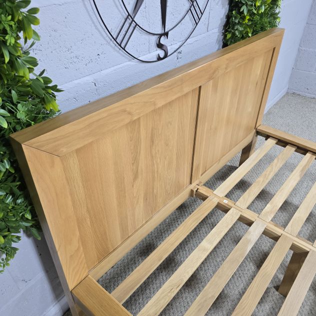 Peek inside its story... then write your own chapter with this pre-loved Oak FurnitureLand solid oak double bed frame.