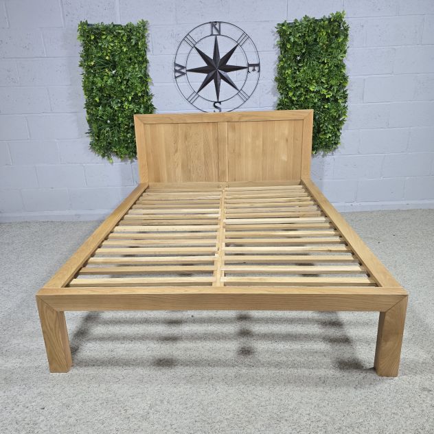 Peek inside its story... then write your own chapter with this pre-loved Oak FurnitureLand solid oak double bed frame.