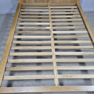 Peek inside its story... then write your own chapter with this pre-loved Oak FurnitureLand solid oak double bed frame.