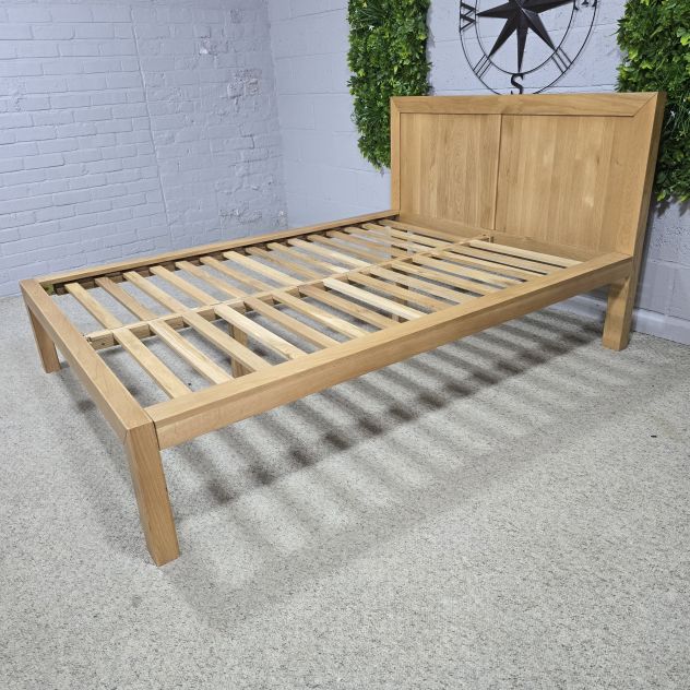 Peek inside its story... then write your own chapter with this pre-loved Oak FurnitureLand solid oak double bed frame.