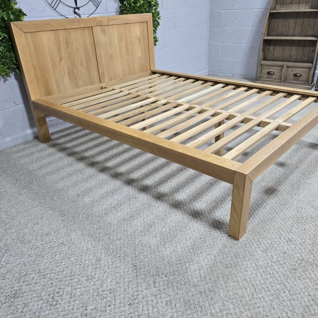 Peek inside its story... then write your own chapter with this pre-loved Oak FurnitureLand solid oak double bed frame.