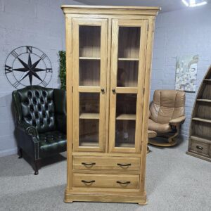 Peek inside its story... then write your own chapter with the Canterbury solid oak display unit from Oak FurnitureLand Peek inside its story... then write your own chapter with the Canterbury solid oak display unit from Oak FurnitureLand