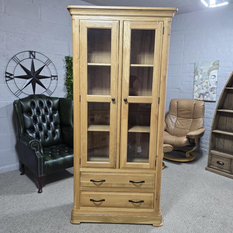 Peek inside its story... then write your own chapter with the Canterbury solid oak display unit from Oak FurnitureLand Peek inside its story... then write your own chapter with the Canterbury solid oak display unit from Oak FurnitureLand