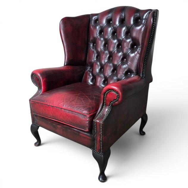 Peek inside its story... then write your own chapter with this second-hand Chesterfield Queen Ann wingback armchair Peek inside its story... then write your own chapter with this second-hand Chesterfield Queen Ann wingback armchair