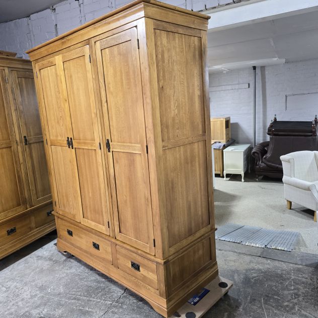 Peek inside its story... then write your own chapter with this stunning second-hand French Farmhouse Rustic Solid Oak Triple Wardrobe. Peek inside its story... then write your own chapter with this stunning second-hand French Farmhouse Rustic Solid Oak Triple Wardrobe.