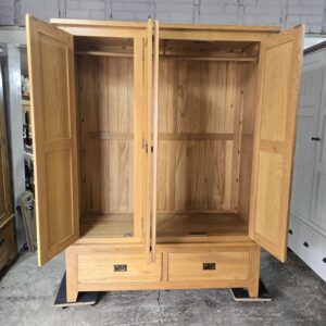 Pre-loved Solid Oak Triple Wardrobe: Timeless Quality at a Fraction of the Cost Pre-loved Solid Oak Triple Wardrobe: Timeless Quality at a Fraction of the Cost