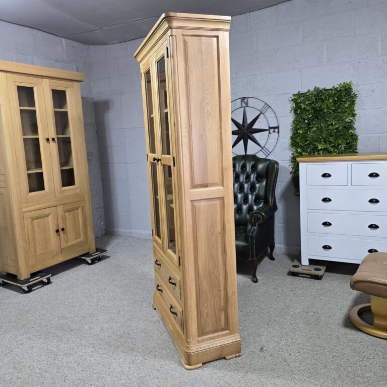 Peek inside its story... then write your own chapter with the Canterbury solid oak display unit from Oak FurnitureLand Peek inside its story... then write your own chapter with the Canterbury solid oak display unit from Oak FurnitureLand