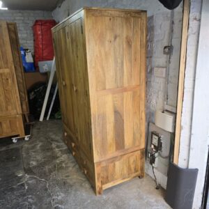 Explore the elegance of this pre-loved Oak Furniture Land Light Mantis triple wardrobe in solid mango wood Explore the elegance of this pre-loved Oak Furniture Land Light Mantis triple wardrobe in solid mango wood