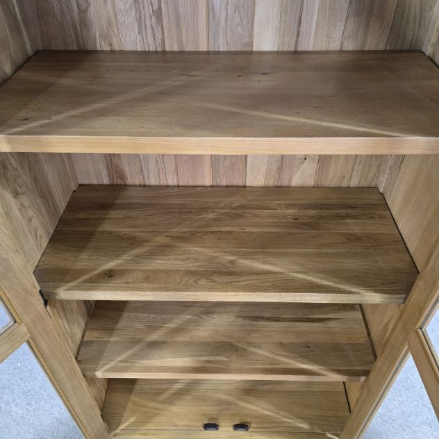 Peek inside its story... then write your own chapter with this PreLoved Oak Furniture Land Romsey solid oak display unit. Peek inside its story... then write your own chapter with this PreLoved Oak Furniture Land Romsey solid oak display unit.