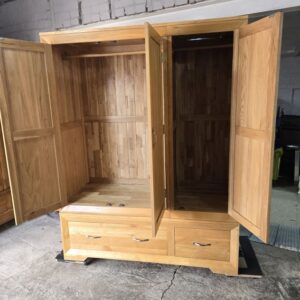 Explore the Pre-Owned Oak FurnitureLand Bevel Triple Wardrobe in Solid Oak Explore the Pre-Owned Oak FurnitureLand Bevel Triple Wardrobe in Solid Oak