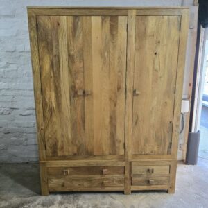 Explore the elegance of this pre-loved Oak Furniture Land Light Mantis triple wardrobe in solid mango wood Explore the elegance of this pre-loved Oak Furniture Land Light Mantis triple wardrobe in solid mango wood