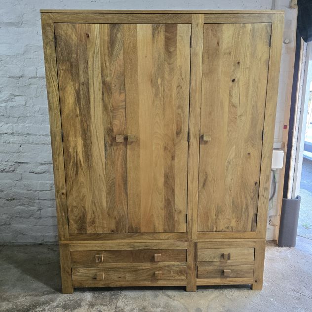 Explore the elegance of this pre-loved Oak Furniture Land Light Mantis triple wardrobe in solid mango wood Explore the elegance of this pre-loved Oak Furniture Land Light Mantis triple wardrobe in solid mango wood