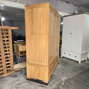 Explore the Pre-Owned Oak FurnitureLand Bevel Triple Wardrobe in Solid Oak Explore the Pre-Owned Oak FurnitureLand Bevel Triple Wardrobe in Solid Oak