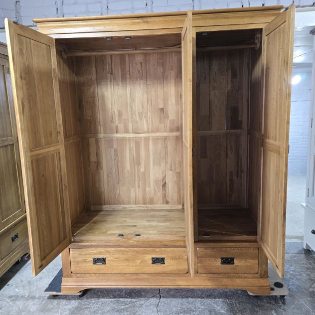 Peek inside its story... then write your own chapter with this stunning second-hand French Farmhouse Rustic Solid Oak Triple Wardrobe. Peek inside its story... then write your own chapter with this stunning second-hand French Farmhouse Rustic Solid Oak Triple Wardrobe.