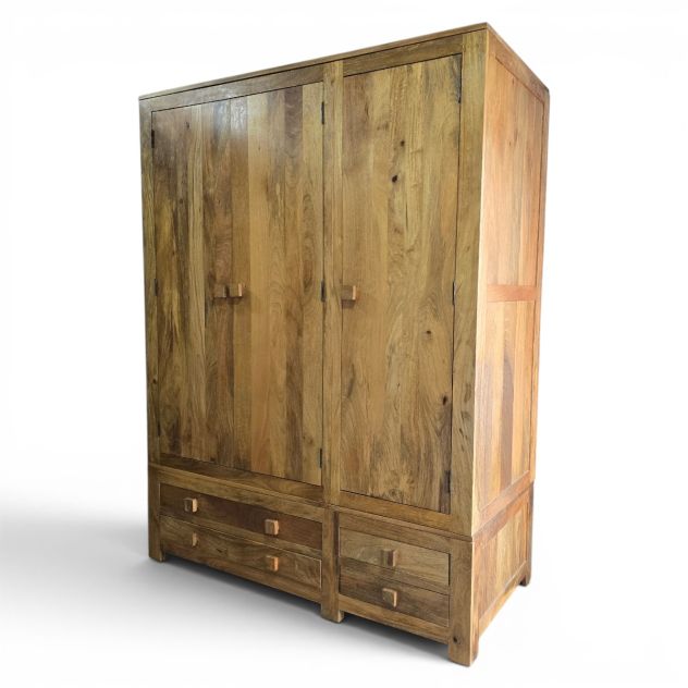 Explore the elegance of this pre-loved Oak Furniture Land Light Mantis triple wardrobe in solid mango wood Explore the elegance of this pre-loved Oak Furniture Land Light Mantis triple wardrobe in solid mango wood